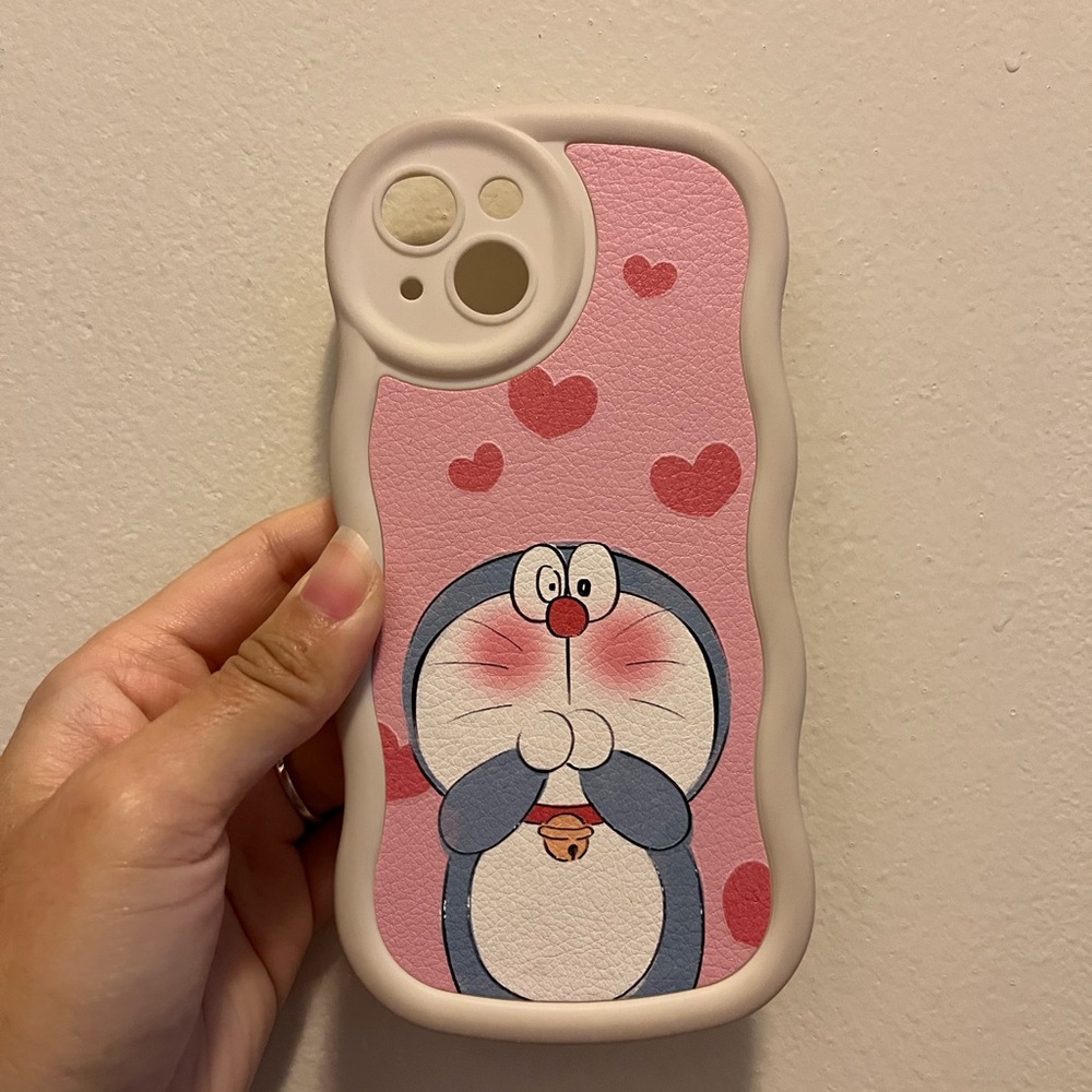 Doraemon’s crushing on you 💓 iPhone case
